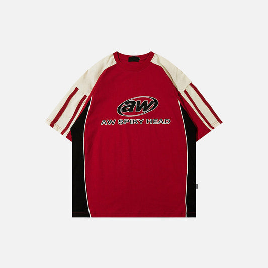 Red color of the AW Spiky Head T-shirt in a gray background