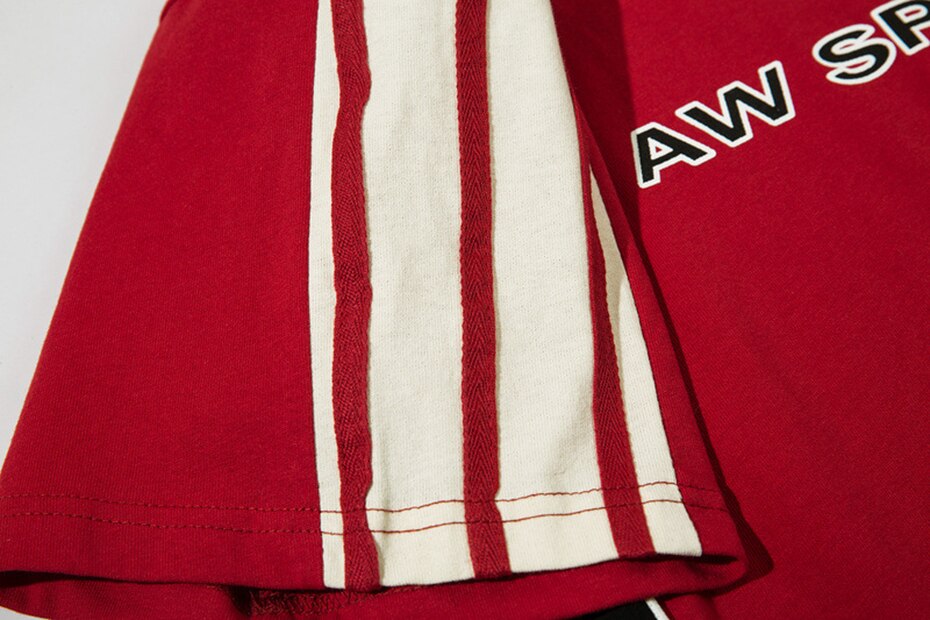 Sleeve of the red AW Spiky Head T-shirt